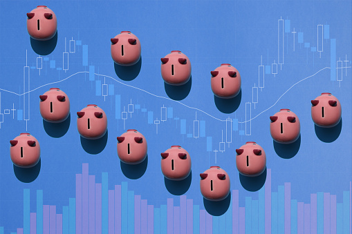 Piggy bank with business finance data analytics graph