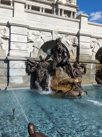 A photograph of the Court of Neptune fountain in front of the Library of Congress in Washington, D.C.