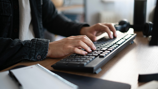 University student using wireless keyboard