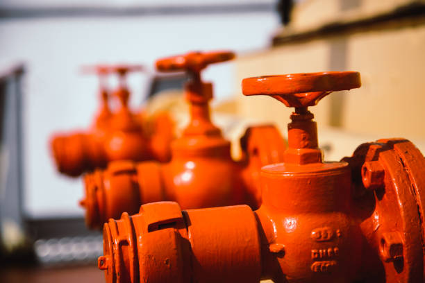 Pipeline and red industrial faucet