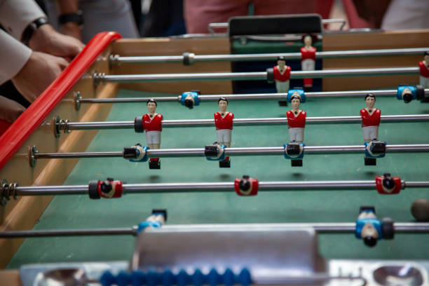 istock Player playing table football with joy 1692286766