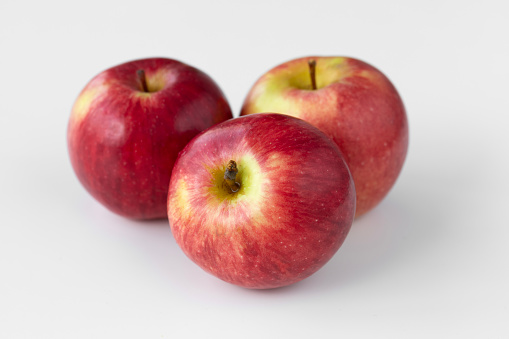 Red apples on a white background.