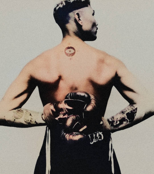 The fighter. Athletic back of a tattooed boxing fighter. Neo Pictoralism. boxer tattoo photos stock pictures, royalty-free photos & images