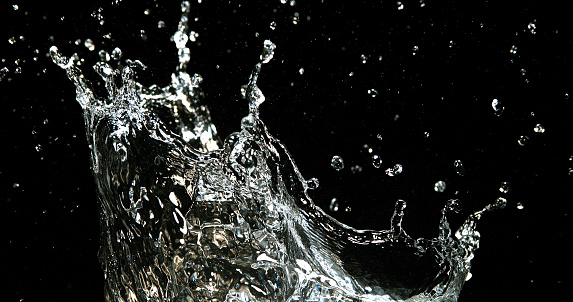 Water Exploding Upwards Effect Water Exploding And Splashing Against Black Background Stock Photo ...