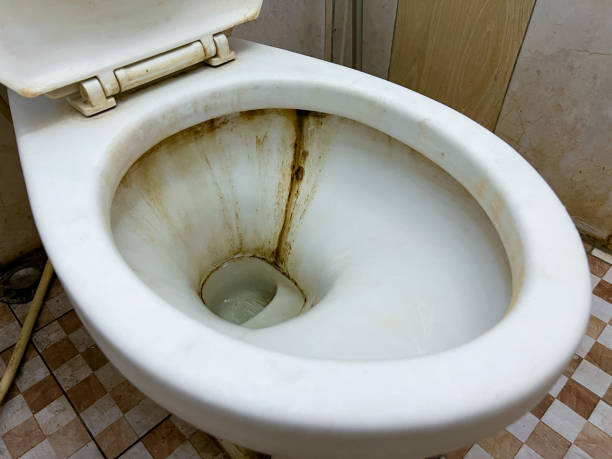 istock Dirty White Colored Toilet Inside the Bathroom 1692343032