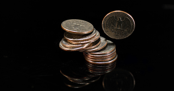 Quarters Falling Quarter Dollar Coins Falling Rolling And Sliding On Black Background ...