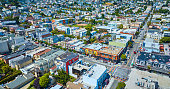 Aerial over San Francisco Castro District with LGBTQIA+ crosswalks with people and city