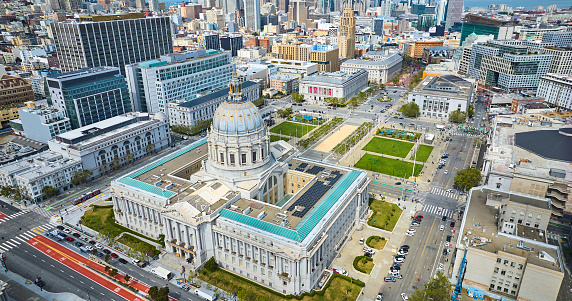 Image of Solar panels on city hall roof with aerial view of San Francisco