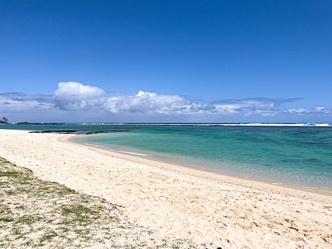 White sand and turquoise coral lagoon and St Felix Beach, Mauritius