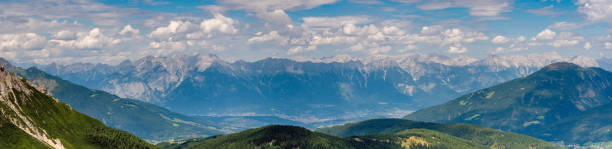 panoramic summer view of the tux alps and the wipptal valley, tyrol, austria. - brennerpas stockfoto's en -beelden
