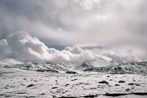 Free Stock Photo of Snow Covered Mountain Range Under Cloudy Sky ...