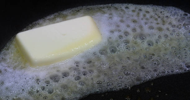 istock Butter that melts and crackles in a stove 1692428523