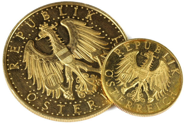 istock Austrian 25 and 100 Schilling gold coins 1692447064