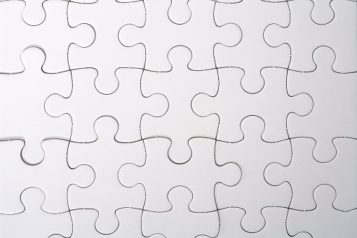 Puzzle pile on white.