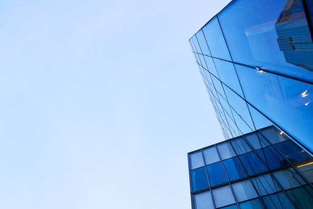 istock Office skyscrapers in front of blue sky background 1692452379