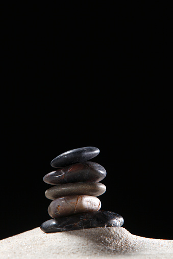 Stack of stones on the sand.