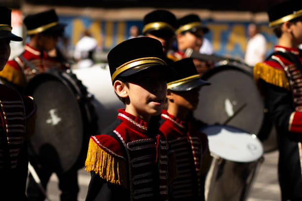 Goiânia, Goias, Brazil – September 07, 2023: A group of young people uniformed in a band during a Brazilian Independence Day parade.