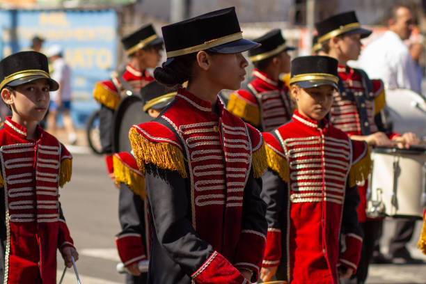 Goiânia, Goias, Brazil – September 07, 2023: A group of young people uniformed in a band during a Brazilian Independence Day parade.