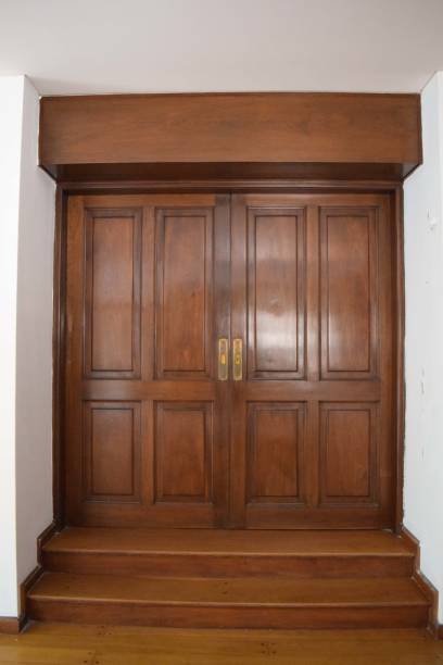 istock double wooden door in a house 1692484512