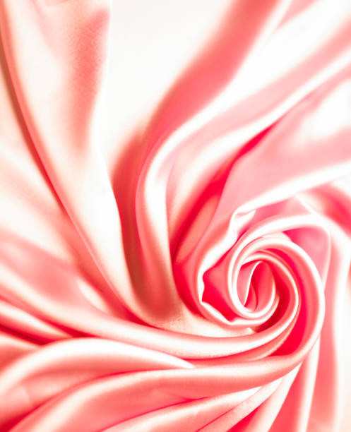 istock Rose gold fabric texture background, detail of silk or linen pattern. 1692495190