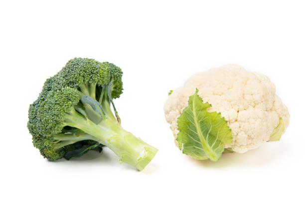istock fresh and ripe cauliflower and broccoli isolated on white 1692512244