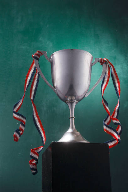 istock retro-styled trophy against a chalkboard 1692519444