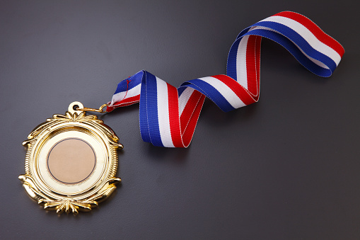 Gold medal isolated on the background.