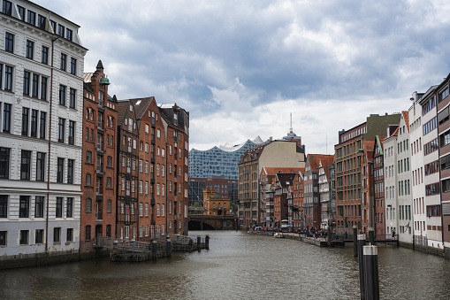 Horizontal view of Deichstrasse area from canal towards Elbphilharmonie in Hamburg