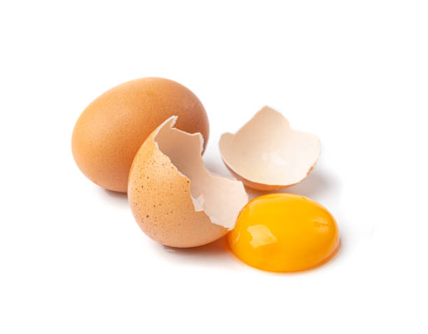 istock Broken Egg Isolated, Raw Yolk and White, Cracked Brown Shell, Fresh Broken Chicken Eggs on White Background 1692598988