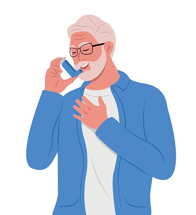 Elderly man uses an asthma inhaler against attack. World asthma day. Bronchial asthma. Allergy, asthmatic. Inhalation drug.