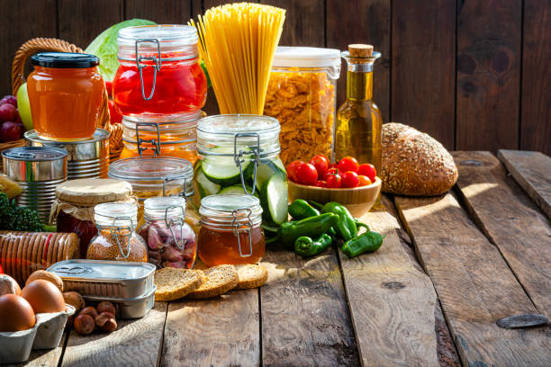 Composition of a large group of food and drink. Includes vegetables, fruits, dairy products, canned food, preserves, legumes, spices, pasta, cooking oil, crackers among others. High resolution 42Mp studio digital capture taken with Sony A7rII and Sony FE 90mm f2.8 macro G OSS lens
