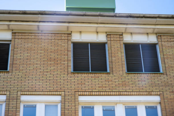 istock Windows of a brick building with sun shade.. 1692605897
