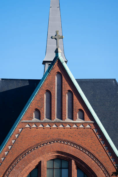 istock Tower and facade of a brick church.. 1692606411