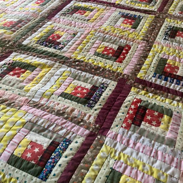 istock American Log Cabin Quilt 1692610257