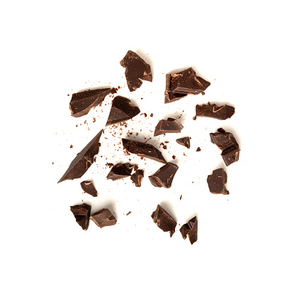 Grated Chocolate Isolated, Broken Crushed Chocolate Shavings, Crumbs Pile, Scattered Flakes, Cocoa Sprinkles for Desserts Decoration on White Background Top View