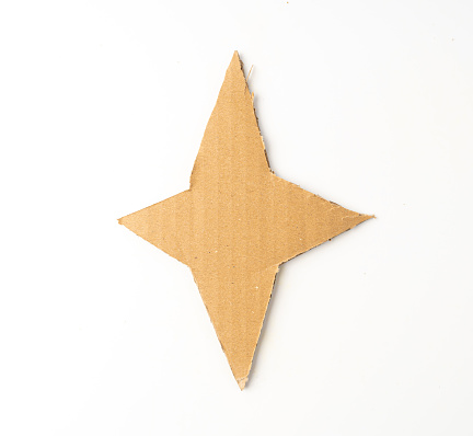 Cardboard Star, Christmas Stars Made of Carton Piece, Ripped Kraft Paper, Brown Wrapping Vintage Paper Xmas Decoration Isolated Top View