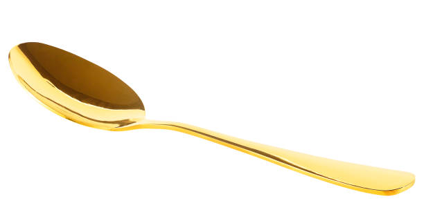 istock Stylish clean gold spoon isolated on a white background. Empty golden spoon. 1692631013