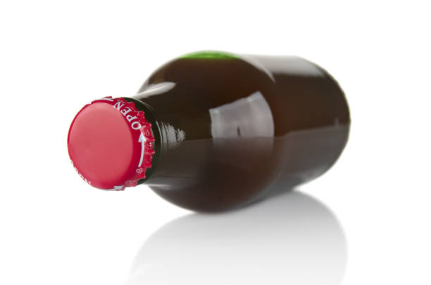 istock Glass bottle with juice close up on a white background 1692631564