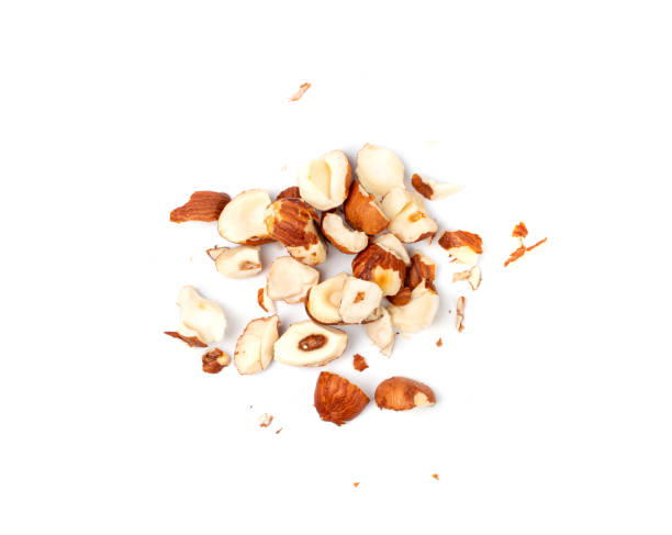 istock Nut Kernels Crumbs, Broken Hazelnuts Pile Isolated, Healthy Organic Crush Nuts Group, Hazel Nut Pieces 1692636069