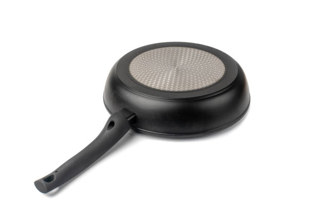 istock Non Stick Frying Pan Isolated, New Eempty Black Nonstick Cookware with Metal Handles Closeup 1692643499