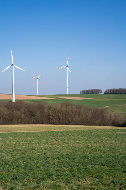istock Landscape with wind turbines on a sunny spring day with blue sky 1692644662