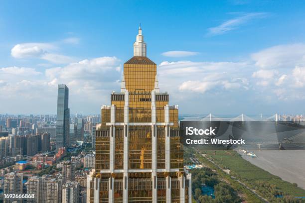A Tall Building With A Very Beautiful View In The Background Wuhan Stock Photo - Download Image Now