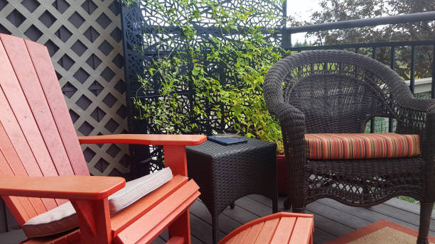 istock Comfortable Modern Deck With Privacy Vines And Metal Partition 1692696877