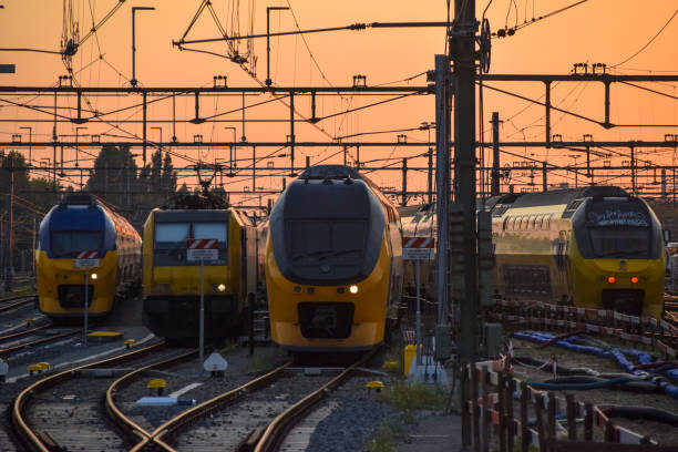 Rotterdam, Netherlands - SEP 15, 2023: Nederlandse Spoorwegen (NS) dutch yellow electric train parked at the Rotterdam central train station.