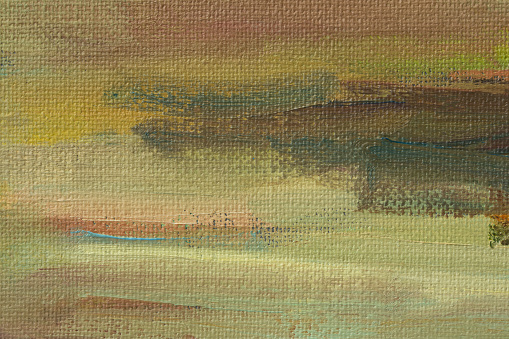 Abstract background autumn painting. Orange brown yellow beige mixed colors of oil paint. A fragment of an artwork in different shades of autumn shades. Modern handmade design with a brush on canvas
