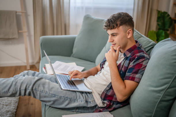 istock Young caucasian man teenager student study at home 1692775692
