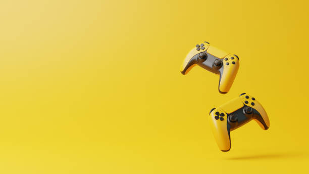 istock Flying gamepad on a yellow background with copy space 1692848180