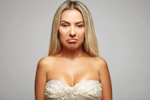 Portrait of a woman with a sad expression.