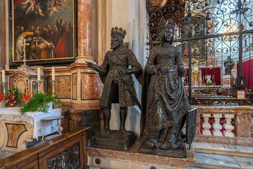 Innsbruck, Austria - Nov 15, 2019: Statues of Queen Joanna and King Ferdinand II at Hofkirche (Court Church) - Innsbruck, Austria