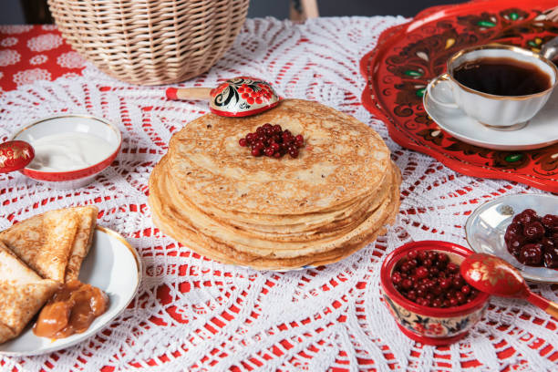 istock Pancakes with berries and sour cream 1693000682
